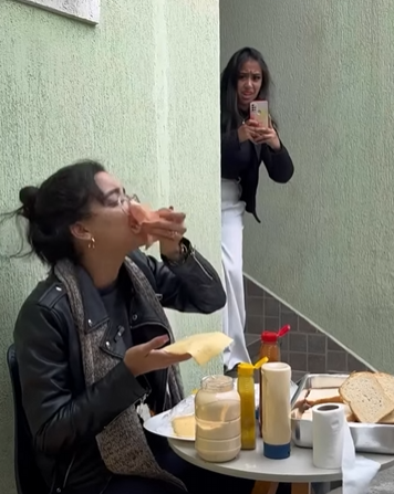 L1901005 Preparava lanches com as mãos sujas vendia os ao part2